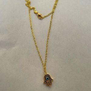 Gold hamsa necklace